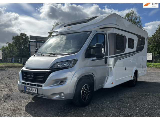 Carado T 338 Half Integraal| automaat | 2x Airconditioning | Luifel | Achteruitrij camera