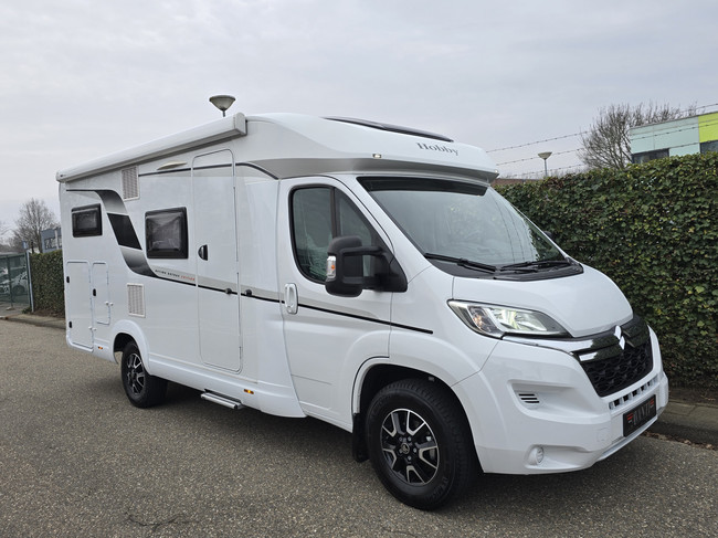 Hobby OPTIMA ONTOUR V65 GE SLECHTS 16.839 KM !! LUCHTVERING LENGTEBEDDEN TV + SATELLIET ZONNEPANEEL DRAAISTOELEN foto: 6