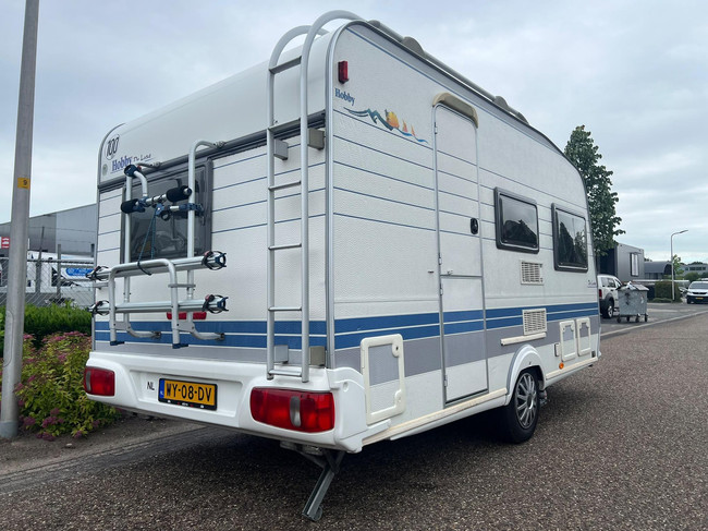 Hobby De Luxe 400 SF | Awning | Bicycle rack | Semi-automatic Mover | Fixed bed | Dinette (Train seat) | Tempo 100 | Shock absorbers photo: 4