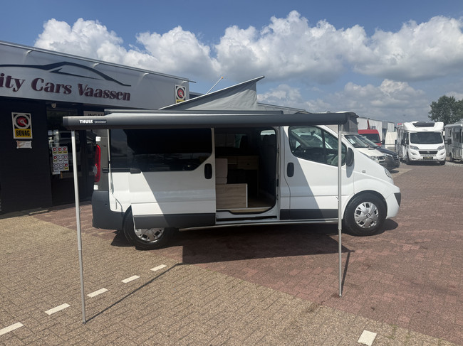 Renault traffic buscamper professioneel omgebouwd hefdak airco cruise ctr 2 slaapplaatsen luifel thule foto: 2