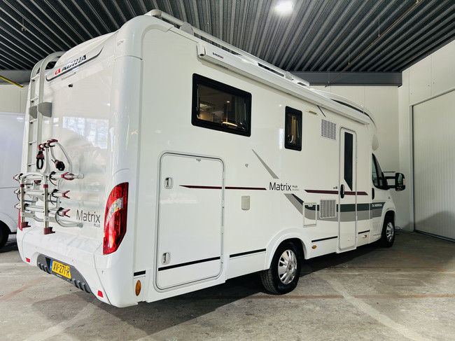 Adria MATRIX M 670SL PLUS Met enkele bedden en slechts 65.000 Km! foto: 12