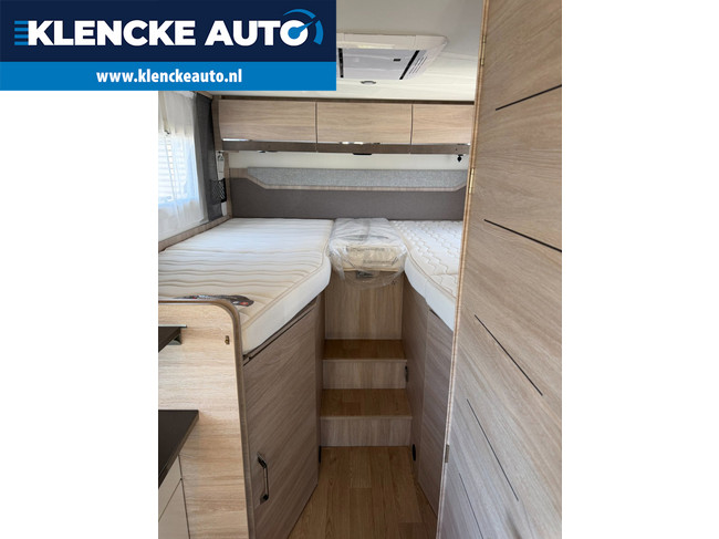 RAPIDO C55 NIEUWSTAAT Dak-airco 26.961km Enkele bedden Lithium Accu's Zonnepaneel 2x airco Trekhaak foto: 4