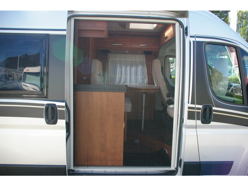 Carthago Malibu 600 Automaat, Dwarsbed.  foto: 6