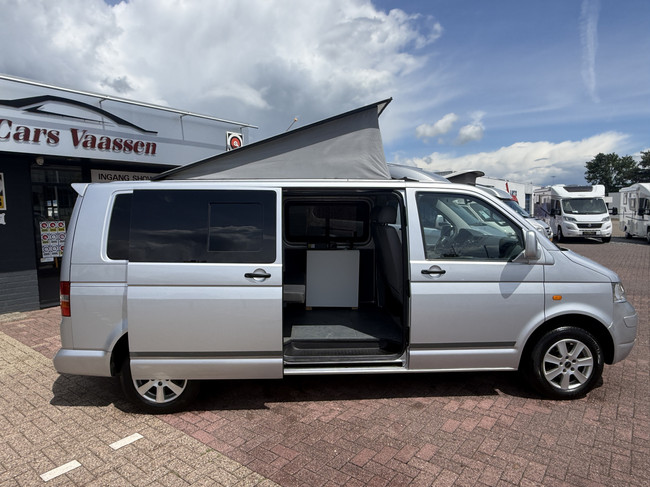 Volkswagen transporter buscamper TDI 131 pk org nl auto nap logisch airco cruise ctr hefdak 2 slaapplaatsen trekhaak foto: 3