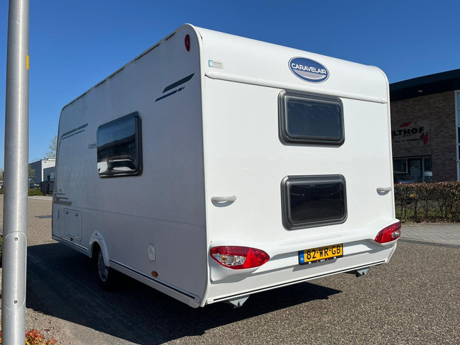 Caravelair Antares 476 Family Bunk bed | Bicycle rack | Awning | TV | French bed | Train seat | Screen photo: 6