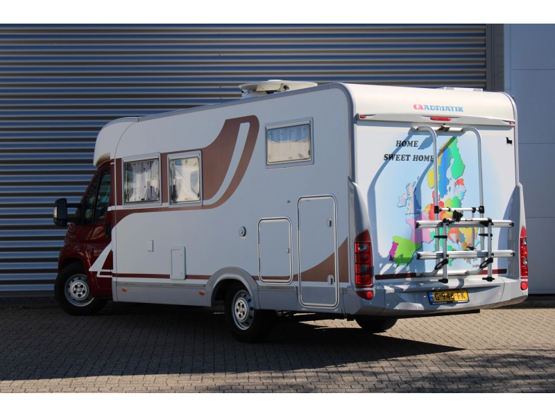 Adria Coral 660 SL 160PK Lengtebedden Airco  foto: 2