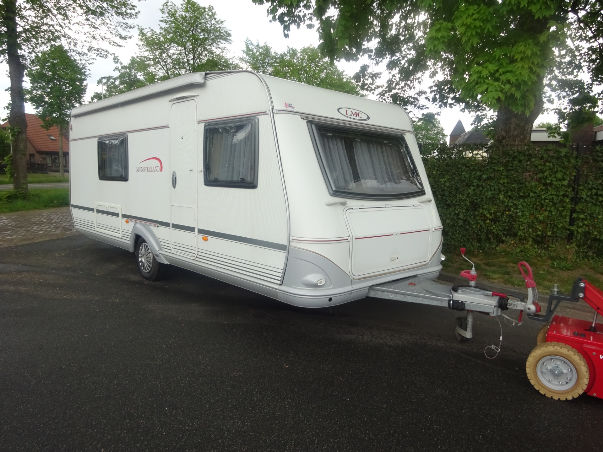 Lmc Munsterland 520 HTE Enkele Bedden+Mover+Luifel foto: 1