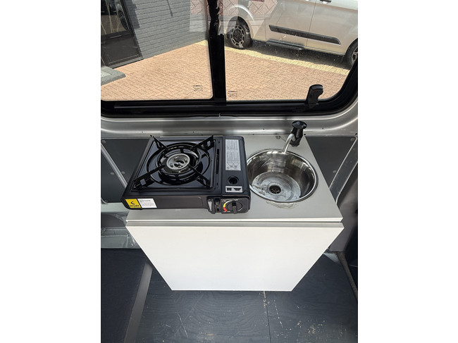 Volkswagen transporter buscamper TDI 131 pk org nl auto nap logisch airco cruise ctr hefdak 2 slaapplaatsen trekhaak foto: 10