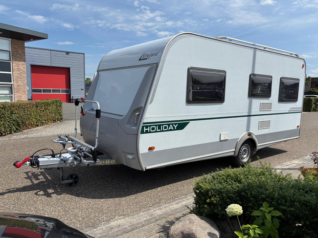 Eifelland Holiday 460 W614700 | 2 Enkele bedden | Mover volautomaat | Voortent met Luifel | Fietsendragers | 3-Pits gasfornuis