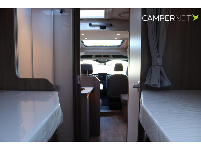 Carado T447 Edition 26 165pk Automaat | Lengtebedden | Luifel | Hefbed | Gescheiden douche | Fietsendrager | 12'' Ford multimediasystee foto: 19