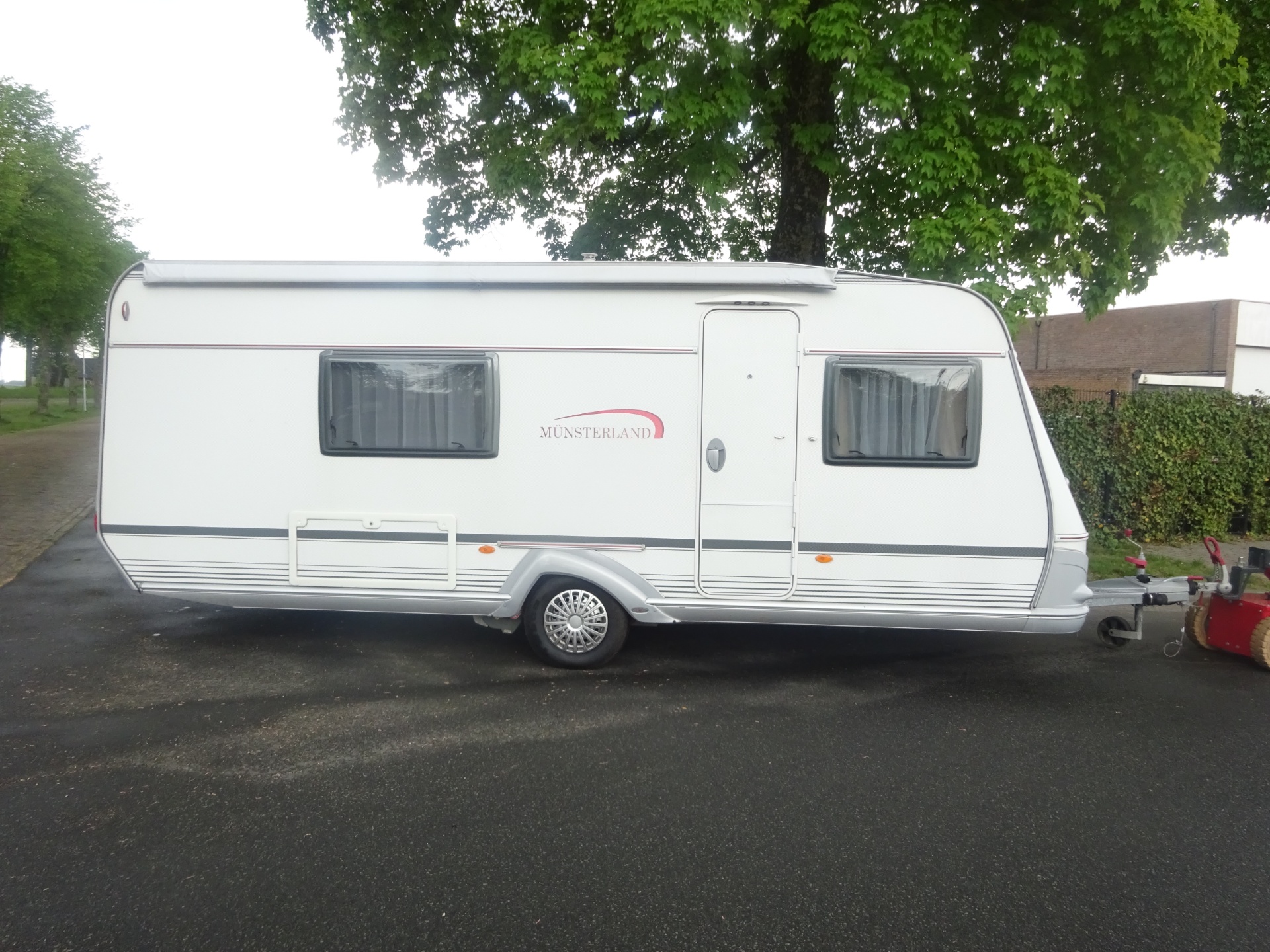 Lmc Munsterland 520 HTE Enkele Bedden+Mover+Luifel foto: 2