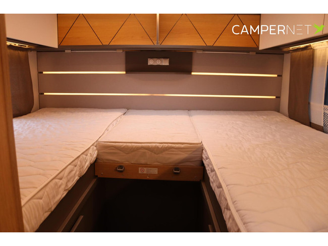 Camping-car LMC Tourer Lift H664 170 ch Automatique | Lits longs | Lit relevable | Chauffage diesel | Grand garage | Porte-vélos | Système multimédia | Photo : 15