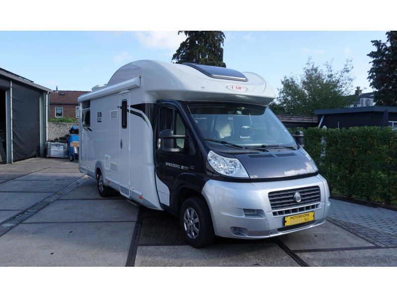 LMC Breezer 730 H Lengte bedden en hefbed  foto: 1