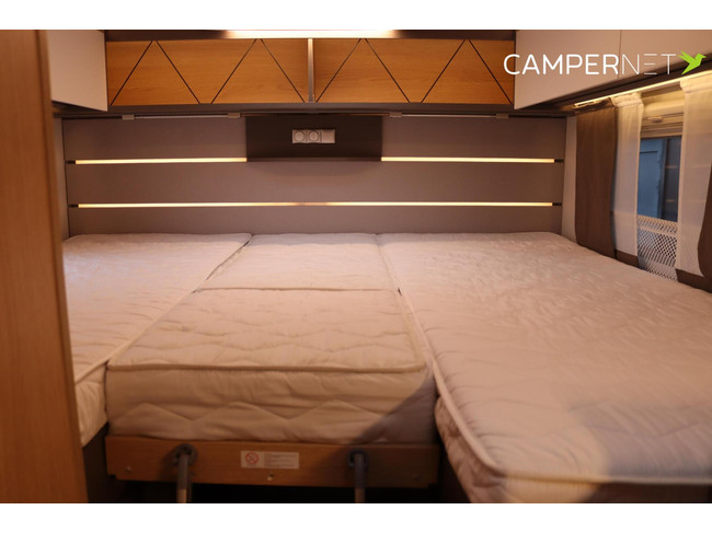 Camping-car LMC Tourer Lift H664 170 ch Automatique | Lits longs | Lit relevable | Chauffage diesel | Grand garage | Porte-vélos | Système multimédia | Photo : 17