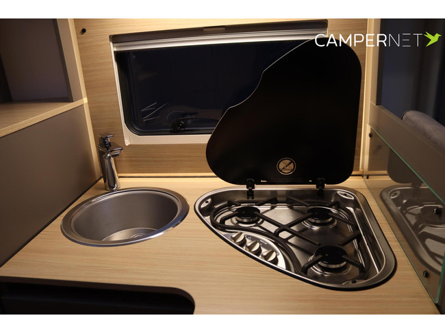 Camping-car LMC Tourer Lift H664 170 ch Automatique | Lits longs | Lit relevable | Chauffage diesel | Grand garage | Porte-vélos | Système multimédia | Photo : 12