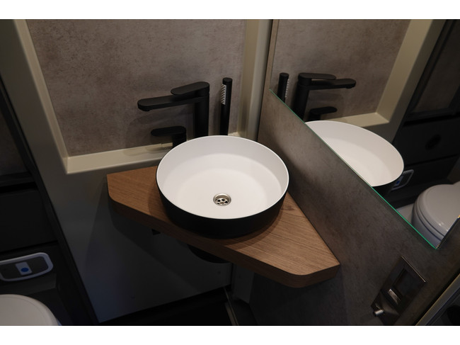 NIESMANN BISCHOFF iSmove 6.9 E 180Pk Automaat | Eifelgrijs | Lengtebedden foto: 12