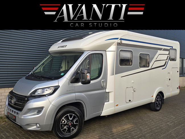 Hymer TRAMP GL 578 AMBITION 130 PK SLECHTS 29.972 KM DIGITALE ACHTERUITKIJKSPIEGEL LENGTEBEDDEN TV + SATELLIET DRAAISTOELEN