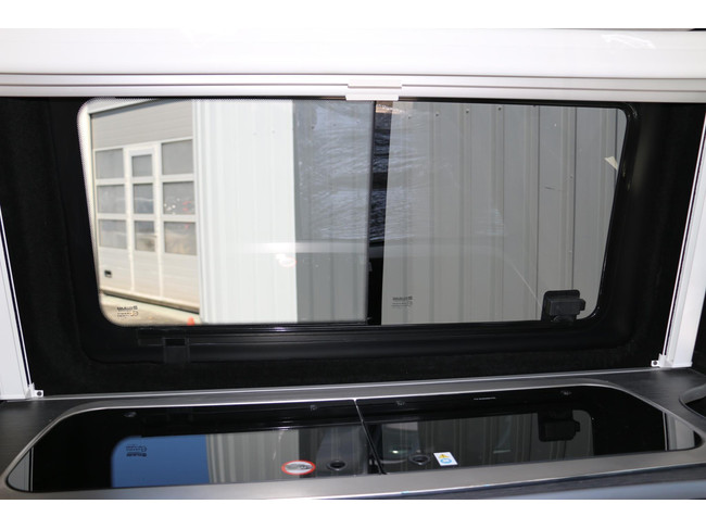 Volkswagen Transporter Kombi 2.0 TDI L1H1 4 Schlafpl&auml;tze | Tempomat | Neues Interieur | drehbarer Vordersitz | Insektenschutzgitter | K&uuml;hlschrank / Gefrierfach | Foto: 18