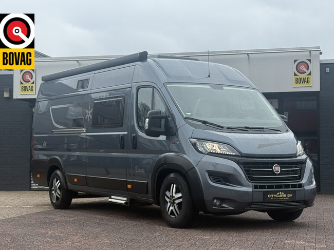 Karmann davis 620 9 traps automaat buscamper 141 pk euro 6 lengte bedden luifel hordeur uitzwenkbare fietsendrager zonnepanneel hoofdfoto: 1