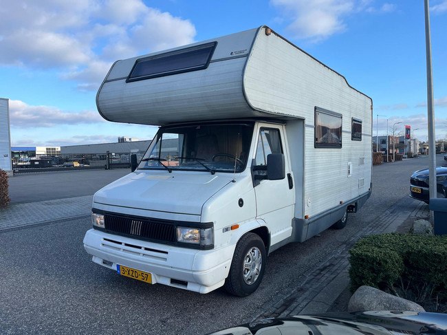 Fiat Ducato 14 2.5 Gran Volume | Goofy | Fahrradtr&auml;ger | Anh&auml;ngerkupplung | 7 Personen | Heizung | K&uuml;hlschrank | Alkovenbett | 2x Zugsitz Foto: 2