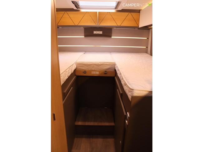 Camping-car LMC Tourer Lift H664 170 ch Automatique | Lits longs | Lit relevable | Chauffage diesel | Grand garage | Porte-vélos | Système multimédia | Photo : 14