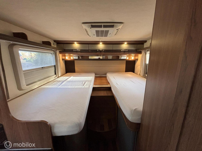 Knaus 650 MEG Sky plus Fiat 2.3 150Pk Automatic | Single beds | Lift-bed | Roof air conditioning |Shower/toilet | XXL Garage | Satellite TV|TOP CONDITION photo: 2