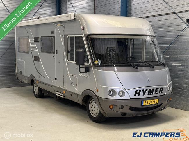 Hymer B 654 Fransbed + Hefbed / Airco op motor! foto: 0