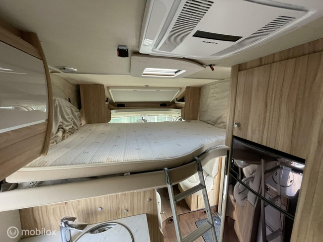 Hymer Tramp 698 Semi-integraal met Hef én Queensbed 2X Airco, Solar zéér weinig km's! foto: 2