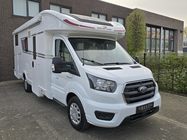Ford ROLLER TEAM KRONOS 284 P AUTOMAAT 170 PK AIRCO SOLAR LENGTEBEDDEN 1E EIGENAAR DRAAISTOELEN TV + SATELLIET SLECHTS 36.881 KM foto: 6