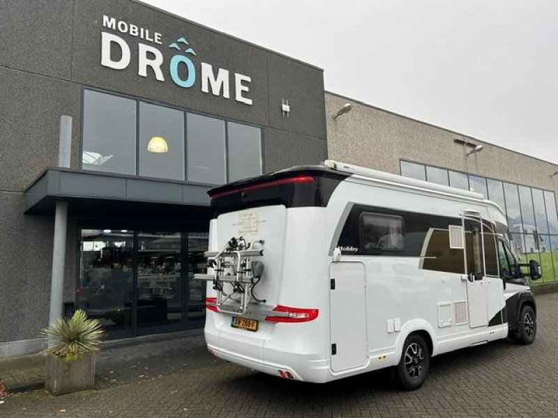 Hobby Optima Premium 65 GQ Cama Queen y cama abatible foto: 2