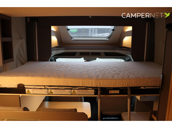 Camping-car LMC Tourer Lift H664 170 ch Automatique | Lits longs | Lit relevable | Chauffage diesel | Grand garage | Porte-vélos | Système multimédia | Photo : 21