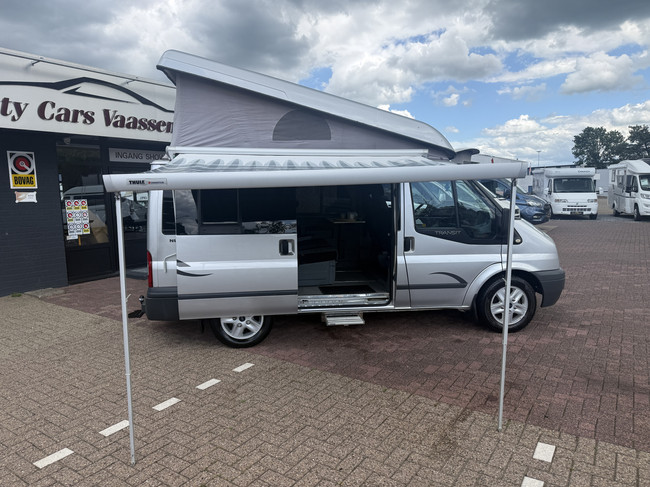 Westfalia ford nugget 4 slaapplaatsen airco hefdak lmv standkachel trekhaak zonnepaneel bearlock foto: 4