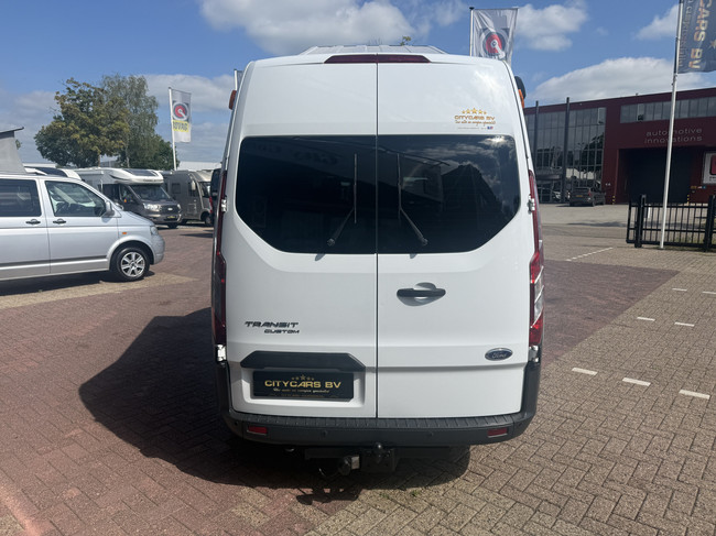 Ford transit buscamper professioneel omgebouwd hefdak airco cruise ctr 2 slaapplaatsen luifel thule trekhaak apk t/m 30-09-2027 foto: 5