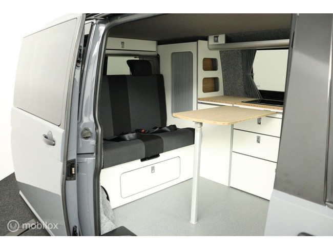 Volkswagen Transporter Buscamper 2.0TDi 102Pk Inbouw nieuw California- look | 4-slaapplaatsen | Slaaphefdak | NIEUWSTAAT photo: 2