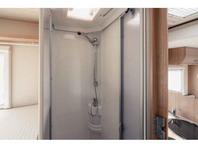 Carado T447 met hefbed foto: 21
