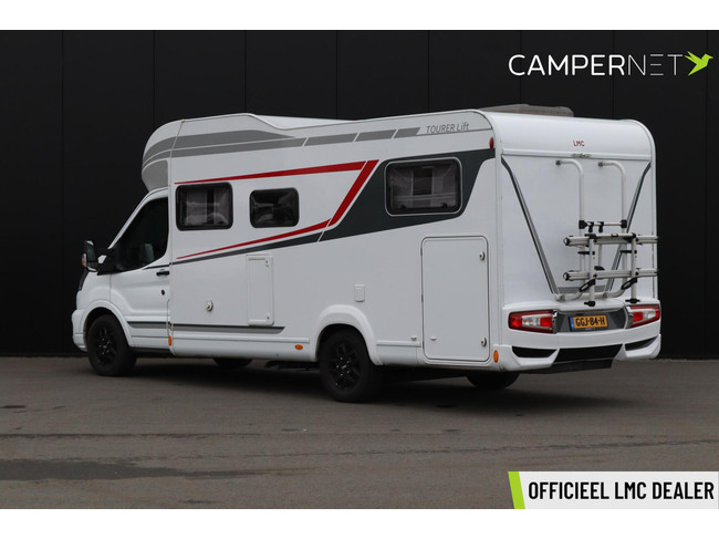 Camping-car LMC Tourer Lift H664 170 ch Automatique | Lits longs | Lit relevable | Chauffage diesel | Grand garage | Porte-vélos | Système multimédia | Photo : 1