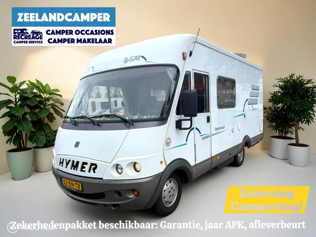 Hymer B574 – Ruime integraalcamper met vast bed én riant hefbed
