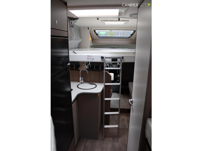 Carado T448 140pk Automaat | Pro + Pakket | Lengtebedden | Luifel | Grote garage | Hefbed | Nieuw uit voorraad leverbaar |Panoramaraam foto: 23