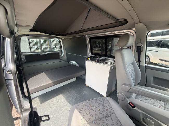 Volkswagen transporter buscamper TDI 131 pk org nl auto nap logisch airco cruise ctr hefdak 2 slaapplaatsen trekhaak foto: 8