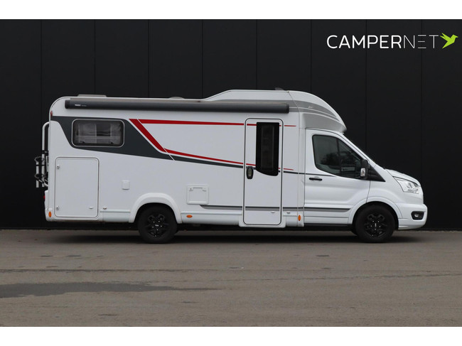 Camping-car LMC Tourer Lift H664 170 ch Automatique | Lits longs | Lit relevable | Chauffage diesel | Grand garage | Porte-vélos | Système multimédia | Photo : 3