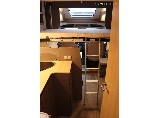 Camping-car LMC Tourer Lift H664 170 ch Automatique | Lits longs | Lit relevable | Chauffage diesel | Grand garage | Porte-vélos | Système multimédia | Photo : 20