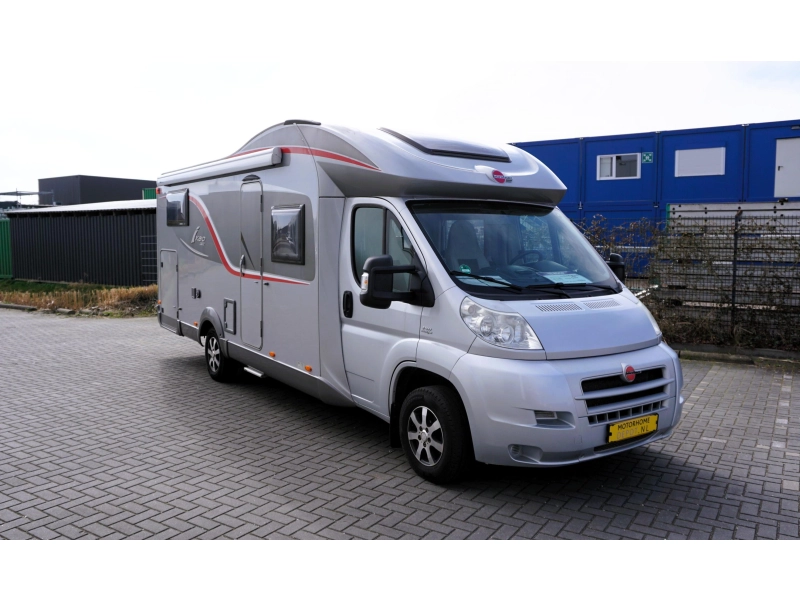B&uuml;rstner Ixeo 726 Camas longitudinales y cama abatible foto: 1