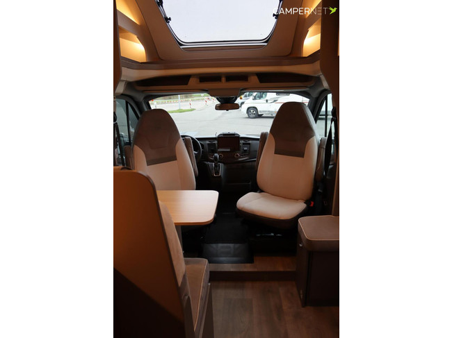 Camping-car LMC Tourer Lift H664 170 ch Automatique | Lits longs | Lit relevable | Chauffage diesel | Grand garage | Porte-vélos | Système multimédia | Photo : 7