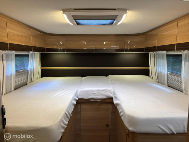 LMC Breezer H737 G Fiat 2.3 150pk Euro 6 | Enkele-bedden | Hefbed | Aparte douche/ wc | XXL Garage | Camera | Fietsendrager | 63dkm foto: 2