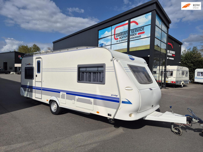 Hobby PRESTIGE 560 Kingsize Bed + Voortent Nw type 2e eig.