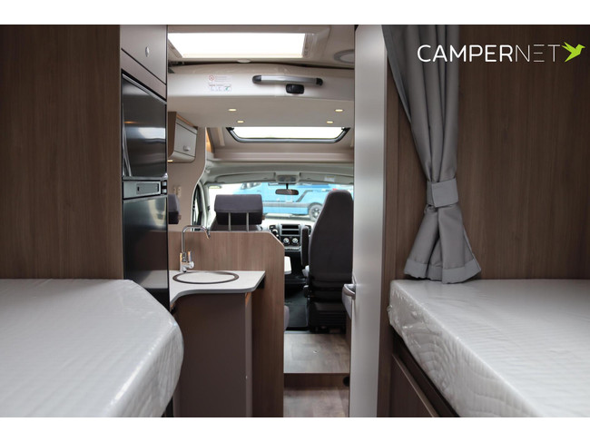 Carado T448 140pk Automaat | Pro + Pakket | Lengtebedden | Luifel | Grote garage | Hefbed | Nieuw uit voorraad leverbaar |Panoramaraam foto: 22